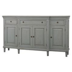 the sideboard has four doors and two drawers