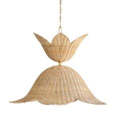 a light fixture made out of wicker with a bird hanging from it's back