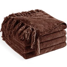 a stack of brown towels folded on top of each other