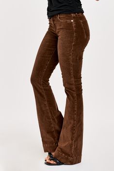 High rise flare leg jeans. It's the lovable fit that sits slightly lower on the waist and fitted skinny in the hips through the knee. Full inseam on stretch velveteen brushed for softness in designer color palettes, accented with wide hem opening.9 1/2" Front Rise (include waistband), 21" Leg Opening, 34" inseam (Size 27) 98% COTTON 2% SPANDEX Machine wash cold, Tumble dry low Imported Zip fly and button closure Five-pocket style Trendy Full-length Fall Flares, Brown Relaxed Fit Mid-rise Jeans, High Rise Cotton Flares For Fall, Brown Flare Jeans With Five Pockets, Casual High Waist Flares For Fall, Casual High-waist Flares For Fall, Brown Flare Jeans With Five Pockets For Fall, Casual Straight Leg Flares For Fall, Casual Wide Leg Flares For Fall