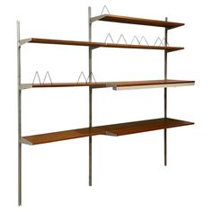 three wooden shelves with metal brackets on the top and bottom, one shelf is empty