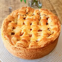 a pie sitting on top of a glass plate