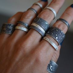 Each hand-forged Topography ring band has a rugged, textured surface that I achieve by fusing recycled silver to heavy-gauge sterling sheet. Perfect for stacking. Luxury Brutalist Jewelry With Oxidized Finish, Silver Barrel Ring, Silversmithing Jewelry, White Look, Stacker Rings, Metalsmithing Jewelry, Single Ring, Textured Ring, Recycled Silver