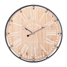 a wooden clock with roman numerals is shown on a white background and reads old town clocks