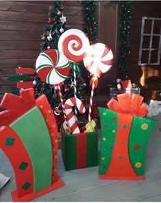 some candy canes and christmas decorations on a table