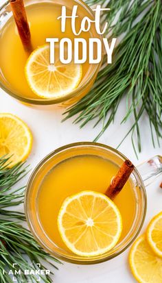 two hot toddy's in glass mugs are on a white countertop with pine branches and orange slices near them. Hot Toddy, Hot Drinks Recipes, Cozy Drinks, Hot Buttered Rum, Alcoholic Beverage, Beverage Recipes, Feeling Under The Weather, Cozy Meals