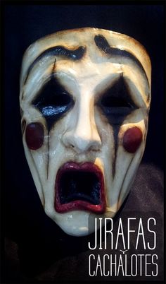 an image of a creepy clown mask with words juraffas cachallotes