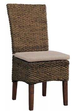 a brown wicker chair with a tan cushion