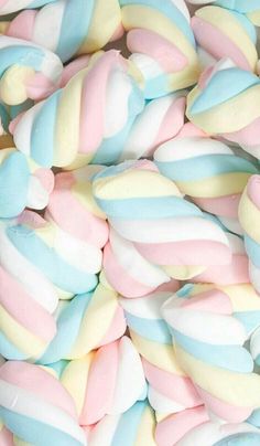 there is a pile of colorful marshmallows on the table