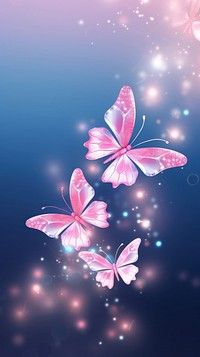 three pink butterflies flying in the sky