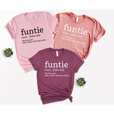 Funtie Definition Shirt, Auntie Shirts, Aunt Shirt, Mother's Day Shirt, Gift For Aunt, Aunt Birthday Shirt, Funny Aunt Tee, New Nephew Gift We wish everyone to smile with our cute, stylish, and trendy graphic T-shirts. We assure you this shirt is the perfect gift whether you buy it for yourself or someone else. Black text is only used for White, Athletic Heather, Baby Blue, Natural, Orange, Yellow, Heather Peach, Pink, Mint, Cancun, Banana Cream, and Desert Pink colored shirts. White text is use Funny Aunt Shirts For Babies, Fun Pink Shirt With Funny Text, Fun Letter Print Tops For Gifts, Pink Tops With Funny Text, Fun Letter Print Tops As Gift, Fun Tops With Letter Print For Gifts, Mother's Day Funny Print Crew Neck Shirt, Casual Birthday Shirt With Funny Text, Fun Crew Neck Shirt