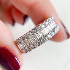 Crafted from gleaming 14k white gold, the band exhibits a scintillating row of baguette diamonds along the top framed by two rows of twinkling round diamonds. 14K White Gold Diamond 1.50CT H color and SI2 in clarity. 5.8gm Size 7.75 sizing available with fee contact us to have it added to the price before checkout. Thank you for visiting our shop! Visit our website DmKJewelry.com Also Follow us on Instagram https://www.instagram.com/dmkjewelry_/ 𝑫𝑴𝑲 𝑱𝒆𝒘𝒆𝒍𝒓𝒚 Each order will be beautiful Round Diamond Band, Baguette Diamond Rings, Baguette Diamonds, Jewelry Lookbook, Baguette Diamond, Diamond Bands, White Gold Diamonds, Round Diamond, Diamond Rings