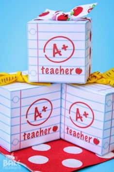 three boxes that are stacked on top of each other with the words teacher written on them