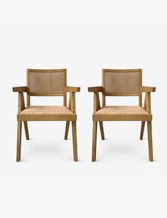 two chairs with cane back and armrests, one in light brown wicker