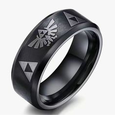 * Brand New! * The Legend Of Zelda Triforce Ring * Sizes Available (Women’s): 8, 10 * Smoke Free Environment Thank You For Your Support Of My Small Business! I Ship Within 1-3 Business Days! Bundle Items For Deep Discounts! Zelda Ring Men, Yugioh Pixel Millenium Ring, Link Twilight Princess, Legend Of Zelda Triforce, Zelda Ring, Mens Black Ring, Zelda Triforce, Black Titanium Ring, Titanium Rings For Men