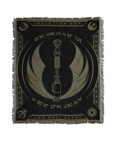 a black and white tapestry with a star wars emblem on it