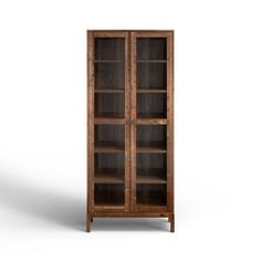 a tall wooden bookcase with glass doors on the front and bottom shelves, against a white background