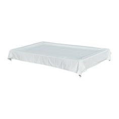 a white table cloth on top of a bed