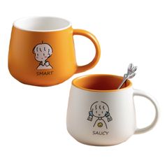 two mugs with spoons in them sitting side by side on a white surface