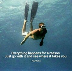 a man swimming in the ocean with a quote on it