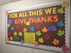 a bulletin board that says for all this we give thanks