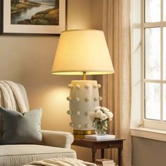 a living room scene with focus on the table lamp