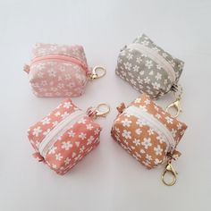 *We have a new batch of the mini boxy zipper pouch keychain with metal lobster clasp as of 8/2/24. Same cuteness with an upgraded version! Made with cotton/linen blend outer fabric and fully lined with white cotton poplin. The zipper closure are all in one natural beige color. Each mini boxy pouch is made with soft fleece interfacing, which makes these cuties ultra plush yet sturdy. Welcome to our Etsy store, where practicality meets style! Introducing our Mini Zipper Box Pouch - the perfect accessory to keep your mini essentials organized on the go. It has a metal lobster clasp so you can easily attach it to any wristlet key fob, bag, backpack, or purse. No more worrying losing small items in the depths of your bag! Ideal for storing: *Cash/ coins *Small cosmetics, toiletries, tampons *Ea Mini Pouch Keychain, Zipper Box Pouch, Mini Essentials, Boxy Pouch, Mini Zipper Pouch, Pouch Keychain, Aesthetic School, Purse Essentials, Cute Gifts For Her