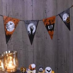 halloween decorations and candles on a table