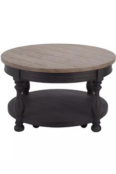 an oval wooden table with wheels on the bottom and two small round bases in grey wood