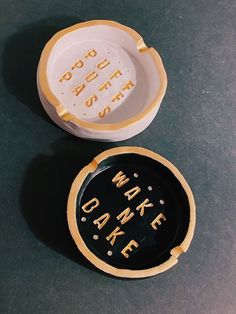 two small dishes sitting next to each other on a table