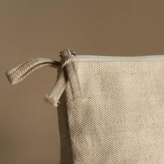 the zippered pouch is made from natural linen