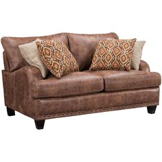 a brown leather couch with two pillows on the armrests and an accent pillow