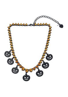 Glistening orange tennis necklace featuring festive pumpkin charms at front. Necklace has an adjustable lobster clasp closure. Made from metal and glass. | Betsey Johnson Pumpkin Bib Necklace, Orange Stone Pumpkin, Halloween Beaded Jewelry, Pumpkin Necklace, Pumpkin Cat, Necklace Orange, Cat Pendant Necklace, Halloween Necklace, Cat Pendant, Cat Pendants