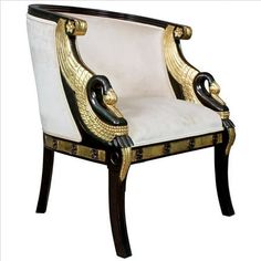 a white and black chair with gold accents