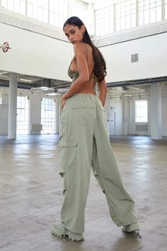 These sleek and stylish Loose Mid-Low Waist Trousers are the perfect option fpr this summer when you want to choose comfort and style. The soft feel make these luxurious to the touch and the perfect pant to dress up or down. Pair these with your favorite platforms and a tank top for the perfect date night look or throw them on with a shirt for a night in. Adjustable Drawstring at Waist--- Adjustable drawstring waist on both sides with toggles, distinct and active, allow for full range of motion, flattering with a sleek silhouette. Cute, chic, and unique. Relaxed Fit--- Straight leg with relaxed fit, mid-low waist design with loose and causal style, offer both style and comfort. Meanwhile, functional four side pockets design is an additional point to this pants. Upgrade your wardrobe with t Pantalon Parachute, Local European, Summer Punk, Parachute Pant, The Perfect Date, Perfect Date Night, Baggy Sweatpants, Perfect Pant, Perfect Date