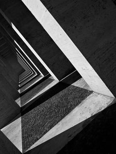 black and white photograph of shadows on concrete