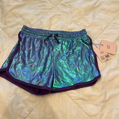 More Than Magic Blue/Purple Metallic Shorts With Adjustable Drawstrings. Nwt Trendy Stretch Purple Shorts, Playful Purple Bottoms For Spring, Purple Stretch Shorts With Elastic Waistband, Casual Purple Playwear Bottoms, Casual Purple Bottoms For Playwear, Purple Bottoms For Playwear In Spring, Galaxy Shorts, Gymnastics Shorts, Mermaid Shorts