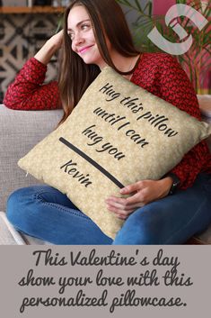 a woman sitting on a couch holding a pillow that says, this valentine's day show your love with this personalized pillow