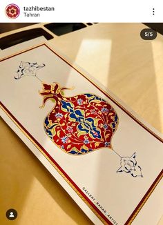 an intricately designed greeting card on a table