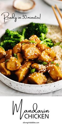 a bowl filled with chicken and broccoli next to rice