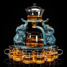 PRICES MAY VARY. ❤【QUALITY MATERIAL】This beautiful teapot set is made of transparent borosilicate glass, which has excellent heat resistance and durability. Making them perfect for use with blooming tea. ❤【MASTERFUL DESIGN】Specially designed gooseneck type non-drip water outlet, smooth water flow. It can effectively prevent water from splashing out.High-quality handle, firm grip, easy to hold and easy to dump. ❤【AUTOMATIC WATER INJECTION】The glass teapot with a removable infuser automatic draws Glass Tea Set, Blooming Tea, Coffee Server, Teapot Set, Tea Maker, Glass Teapot, Fruit Tea, Tea Pot Set, Pot Sets