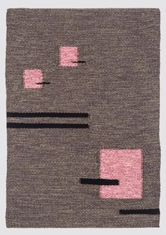 an abstract rug with pink squares and black lines on grey ground, in the shape of a rectangle