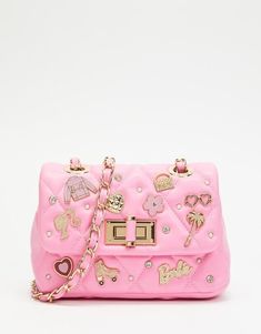 **This Unique & Distinctive Handbag is Final Sale, No Returns. No Extra Discounts Available!** So gorgeous in person... this Barbie Crossbody Bag Pink Quilted w/ Barbie Charms by Aldo is a Limited Edition piece. Inspired by the Y2K aesthetic, this small size quilted crossbody bag exudes the Barbie touch. Adorned in Barbie logo charms and lined in pink Barbie fabric that boasts the signature profile, this handbag guarantees a standout fashion moment. Item ships brand new in sealed package with ta Barbie Bag, Aldo Purses, Aldo Handbags, Snakeskin Purse, Aldo Bags, Bags Pink, Pink Quilts, Pink Barbie, Chain Strap Bag