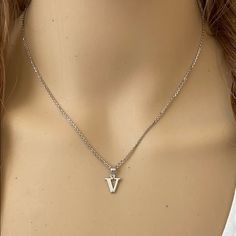 Description: 925 Sterling Silver Mini Small Initial Letter V Pendant Necklace Item No.: H89.Q Metal Type: 925 Sterling Silver (Available In 10k And 14k Gold) Metal Color: Silver Height With Bale: 15 Mm Width: 4.8 Mm Italian Rolo Chain In 16", 18", 20", 22" Available In Another Listings In Any Letter A-Z Made To Order. Please Allow 10-15 Days To Be Shipped. V Initial Necklace, Doctor Lifestyle, Letter V Necklace, Random Jewelry, V Initial, V Pendant, V Letter, V Necklace, Initial Necklace Silver