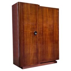 a large wooden cabinet with two doors on one side and an opening to the other