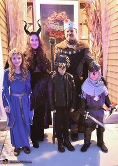 a group of people dressed up in costumes