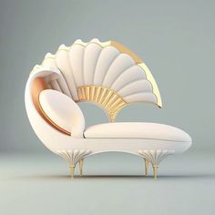 a white couch with gold accents and a scallop shaped back rests in front of a gray background