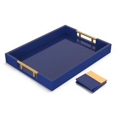 a blue tray with a wooden handle and two matching napkins on the side, next to it