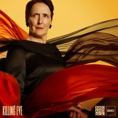 a woman wearing a black dress and red shawl with the words killing eve on it