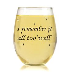 a wine glass with the words i remember it at too well written in black ink